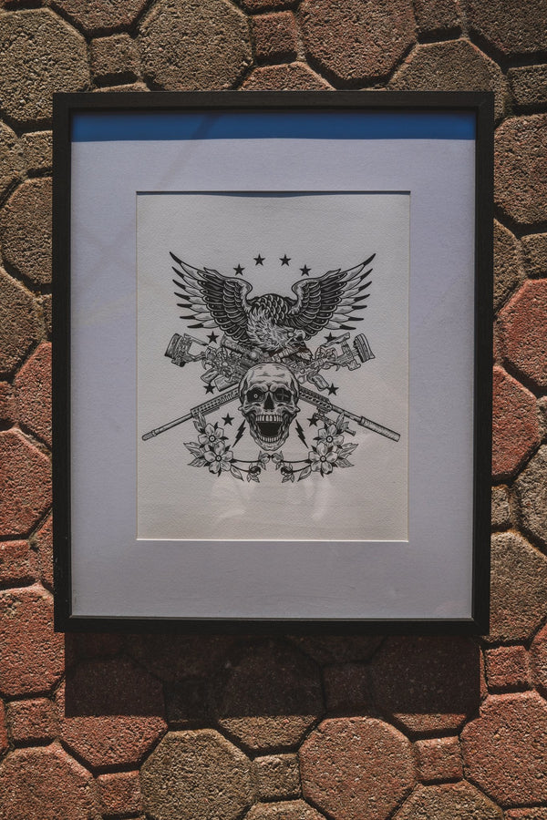 Framed artwork of a black and white eagle on a stone surface